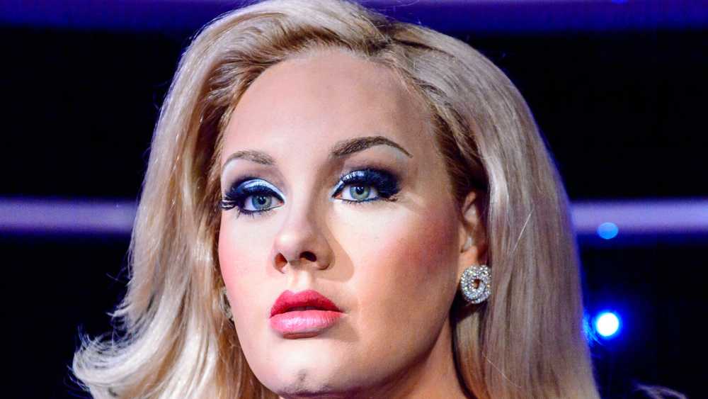 Adele se carga el botón de reproduccion aleatoria de spotify Adele se carga el botón de reproduccion aleatoria de spotify